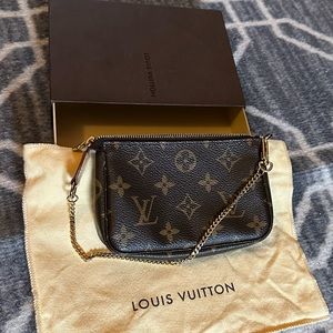 Authentic Mini Pochette LV, purchased in Paris. Pristine condition